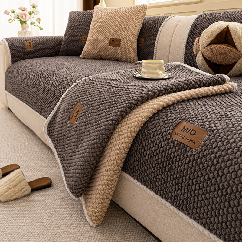 Close-up of the Gray Fur & Haven SofaShield cover's bead texture and rope edge