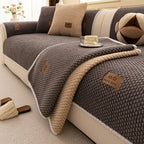Close-up of the Gray Fur & Haven SofaShield cover's bead texture and rope edge